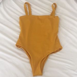 Brand new, never worn Wanderlust 1-piece swimsuit
